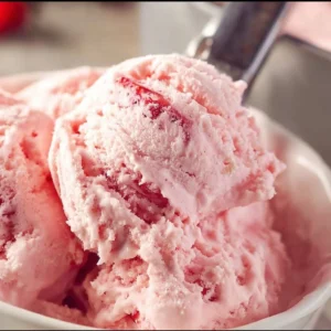 Homemade Strawberry Ice Cream 3 Delicious homemade strawberry ice cream served in a bowl.