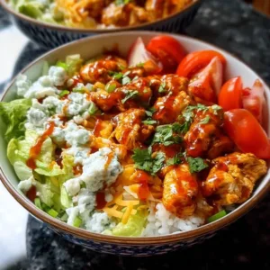 Buffalo Chicken Bowls 3 Savory Buffalo Chicken Bowls topped with fresh ingredients and spicy sauce